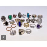 Twenty five assorted silver dress rings to include stone set and plain examples, various styles