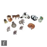 A collection of assorted Beswick animals to include a Pekinese model 1059, a Fox model 1017, a Koala