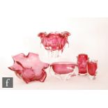 A collection of five post war Czechoslovakian glass vases and bowls, all pink cased in clear, to