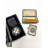 A mixed collection of items, to include an early 20th Century silver hallmarked vesta with Australia