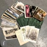 A large collection of Edwardian postcards to include remembrance cards, scenic views, theatrical