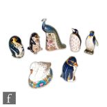 Seven Royal Crown Derby bird paperweights including Designers Choice Collection Derby Peacock