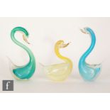 A collection of three post war Italian stylised glass ducks in the manner of Seguso, each cased in