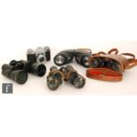 A pair of Steiner Bayreuth 7X50E binoculars, a pair of Carl Zeiss Jena binoculars, two other