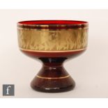 A 1960s Czechoslovakian Chlum U Trebone Garnet and Gold glass bowl designed by Jan Gabrhel, of