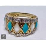 A 9ct hallmarked turquoise, mother of pearl and diamond ring with alternating diamond shaped