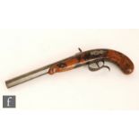 A 19th Century Percussion pistol, 9 1/4" octagonal barrel mounted to a figured walnut stock with