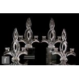 A matched set of four 1930s French clear crystal candlesticks by Art Vannes of stylised leaf form