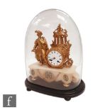A 19th Century French overpainted gilt mantle clock, the alabaster mounted with a figure wearing a