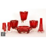 A group of seven Whitefriars Ruby glass vases and bowls, all of varying lobed form including,