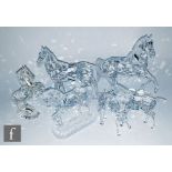 A group of Swarovski figures comprising, prancing horse, white stallion, mare horse, trotting