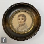 A small late 18th Century pastel portrait miniature of a young gentleman high collar shirt and