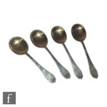 A set of four hallmarked silver dog nose table spoons each with gilt bowl, weight 7.5oz, length