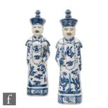 A pair of Chinese late Qing (1644-1912)/Republic Period (1912-49) blue and white glazed figures,