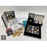 An Elizabeth II 2007 Diamond Wedding silver proof coin, a 1995 Jersey and Guernsey proof coins, a