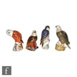 Four Royal Crown Derby bird paperweights including Sea Eagle, Peregrine Falcon and Red Kite, all