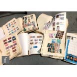 A collection of GB and world stamps contained in six albums. (6)