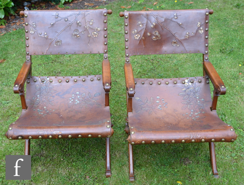 A pair of walnut framed open armchairs in the Aesthetic style, with chamfered X-shaped frames and - Image 2 of 6