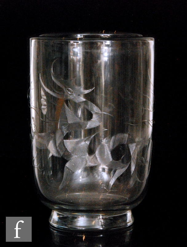 A large 1930s Art Deco clear crystal vase by Steuben, of footed cylindrical form engraved