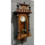 A 19th Century walnut and part ebonised spring driven regulator wall clock, height 92cm.