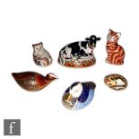 Six assorted Royal Crown Derby paperweights to include a Fresian Cow Buttercup, a cat and a duck,