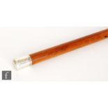 A 19th Century malacca cane with plain silver capped mounts, marks rubbed, length 94cm.