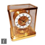 A Jaegar-Le Coultre Atmos clock 540 No 622924 in glazed and brass frame case on plinth base,