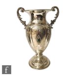 A large late 19th Century Italian silver pedestal vase by Petruzzi & Branca, of footed baluster form