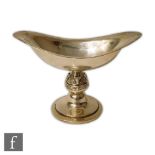 A contemporary silver hallmarked caviar dish, the oval dish rising on a zoomorphic knopped stem,