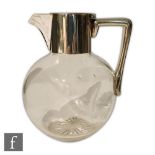 A Victorian hallmarked silver and clear glass claret jug the bulbous glass body with dimple