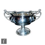 A large early 20th Century pedestal fruit bowl by Thomas Latham & Ernest Morton with oval fluted