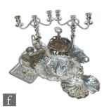A parcel lot of assorted silver plated items to include a pair of three light candelabras, a salver,