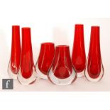 A collection of Whitefriars glass vases in ruby, comprising four pattern 9571 Teardrop vases and two