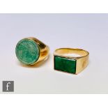 Two mid 20th Century 14ct gentleman's jade rings, one with a rectangular head, the other with a