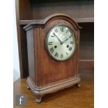 An early 20th Century mahogany cased bracket clock, with German movement striking on a gong,