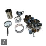 A parcel lot of assorted hallmarked silver and white metal items to include bangles, flat ware,