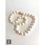 A single row of irregular cultured pearls, each diameter approximately 13mm, length 45cm,