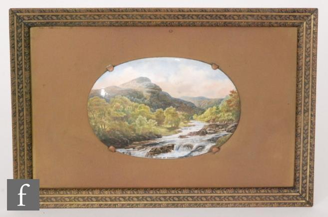 A framed oval enamel plaque hand painted with a scene of 'The Falls of Tummel, Perthshire',