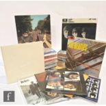 A collection of approximately eighty Beatles LPs, mostly later reissues of the back catalogue and