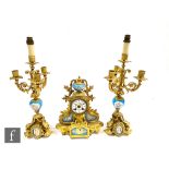 A 19th Century gilt metal and Sevres style panel eight day strike mantle clock garniture, Roman