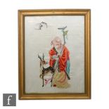 A Chinese 20th Century silkwork embroidered picture, depicting Taoist immortal Jur?jin with staff