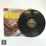 A Beatles LP Please, Please Me, UK Mono, third pressing, PMC 1202, black and yellow label, 33 1/3