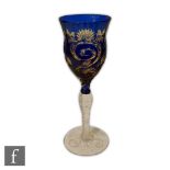 An early 20th Century Stevens & Williams double colour cased wine glass, having a slender ogee