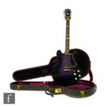 A Gibson ES-335 electric guitar, circa 1968-72, the semi-hollow 'thinline' body in purple burst