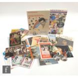 A collection of Elvis Presley related items to include Presleyana V Price Guide, Windmill records