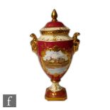 A Coalport vase and cover hand painted by Peter Gosling with a cartouche scene of Madeley Court,