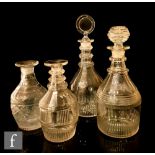 An early 19th Century clear crystal decanter of Prussian form with pillar, slice and mitre cut