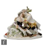 A late 19th to early 20th Century Meissen figural group depicting a young courting couple