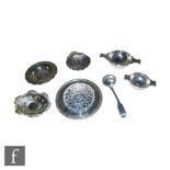 Seven items of hallmarked silver to include two small quaiche shaped bowls, a butter dish with glass