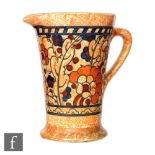 A 1930s Charlotte Rhead for Crown Ducal flower jug decorated in the Byzantine pattern with tubelined